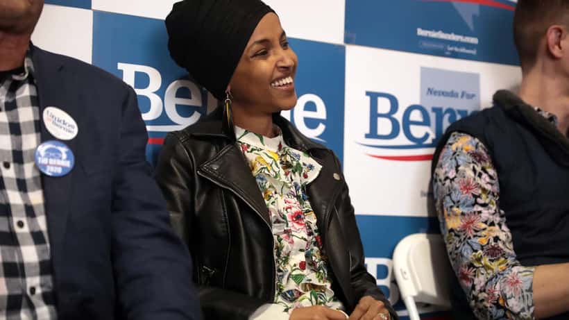 Ilhan Omar speaking at a public event, US congresswoman born in Somalia
