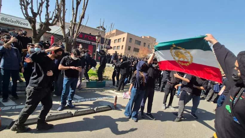 Iranian flag at the University of Technology in Tehran, representing the legal concerns of Iranian-Canadians amid the 2026 conflict