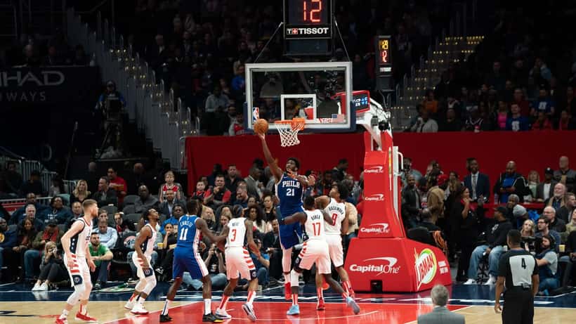 Joel Embiid of the Philadelphia 76ers making a layup during an NBA game