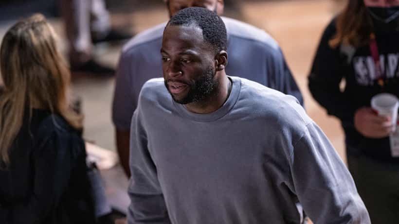 Draymond Green on court during NBA game with Warriors 2026