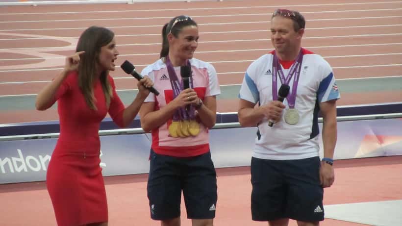 Dame Sarah Storey and Barney Storey being interviewed at the Olympic Stadium about their Paralympic cycling careers
