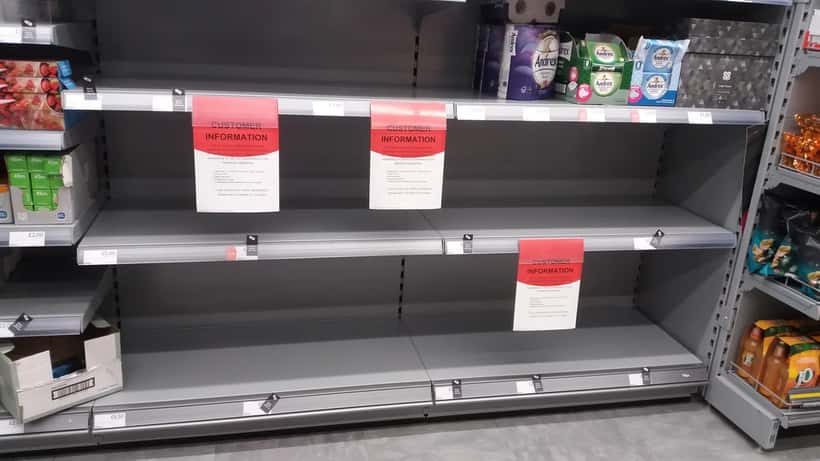 Empty supermarket shelves in St Ives, Cornwall, UK showing food shortage impact