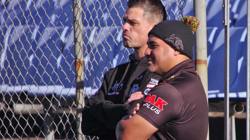 Cameron Ciraldo coaching the Canterbury-Bankstown Bulldogs during NRL training, speaking with player Joe Galuvao