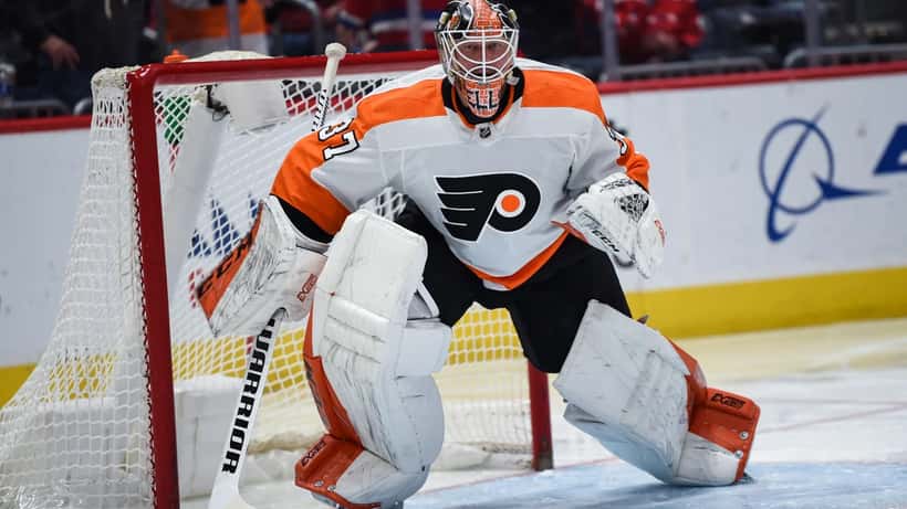 Philadelphia Flyers player on ice during NHL playoff game at arena
