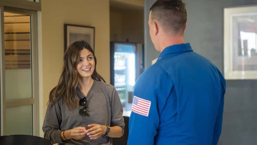 Monica Barbaro flying with the US Navy Blue Angels, reflecting her Hollywood career trajectory
