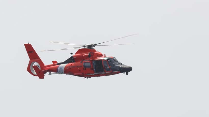 U.S. Coast Guard aircrew conducting operations in the Atlantic Ocean during a search and rescue mission