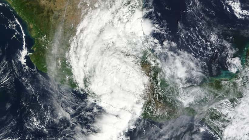 Satellite image of Hurricane Otis remnants over Mexico's Pacific coast, MODIS NASA