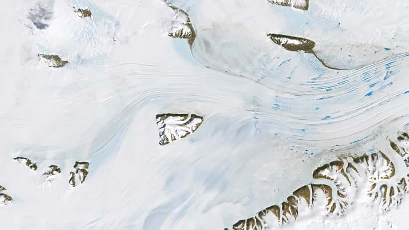 Meltwater ponds on the Antarctic Amery Ice Shelf photographed by NASA, illustrating accelerating ice loss in 2026