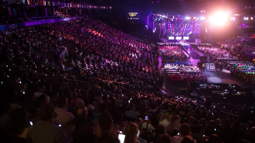 Alessia Cara performing on stage at an opening ceremony