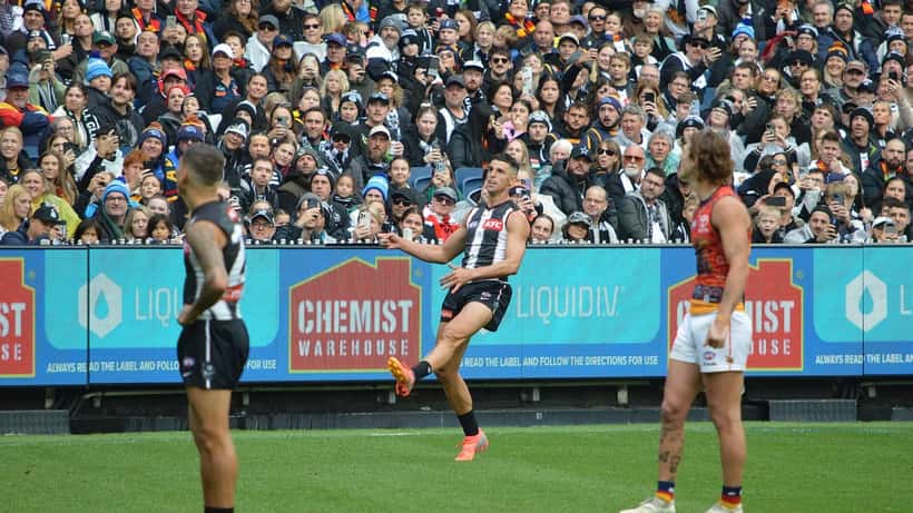 Scott Pendlebury in action for Collingwood, representing AFL athlete wealth management and investment risk