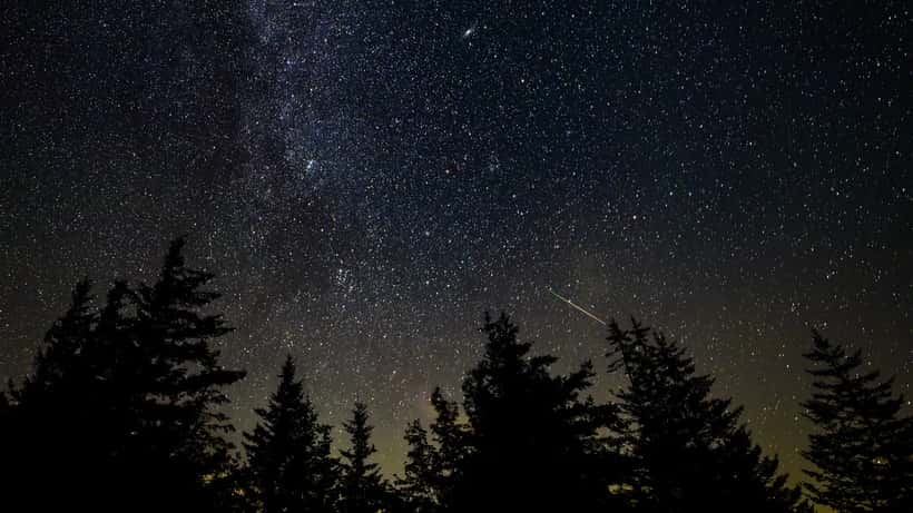 Meteor streaking across a dark night sky, photographed by NASA