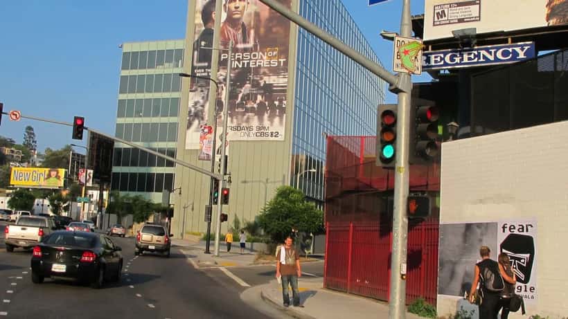 Street art of Scarlett Johansson in Los Angeles referencing AI surveillance and digital identity