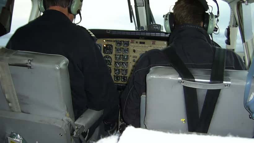 Cockpit of Kenn Borek Air Canadian aircraft showing pilot navigation instruments