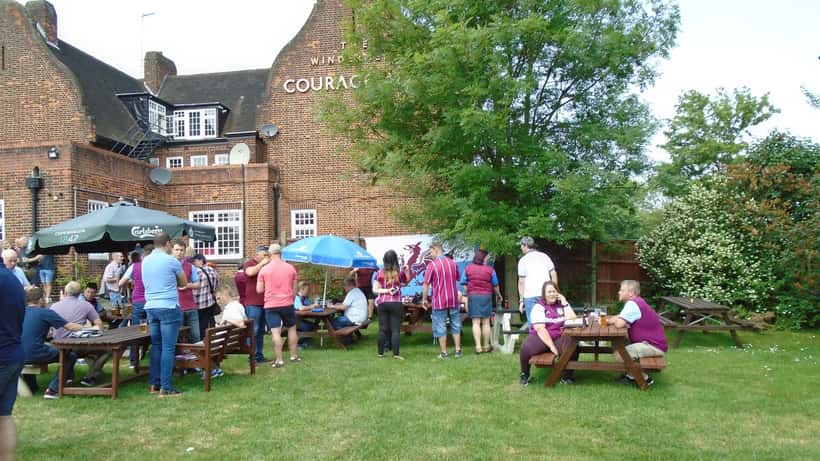 Football fans gathering near Wembley for a Championship match