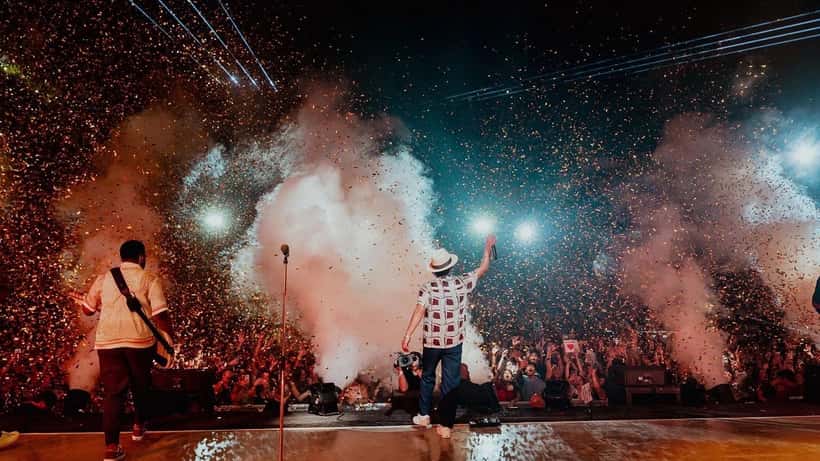 Bruno Mars performing live on stage during concert tour