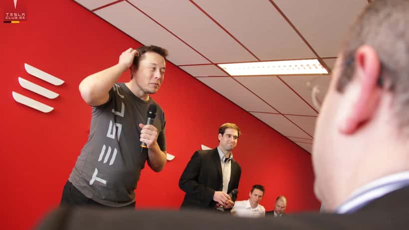 Elon Musk lors d'un événement public, photo de Tesla Owners Club Belgium