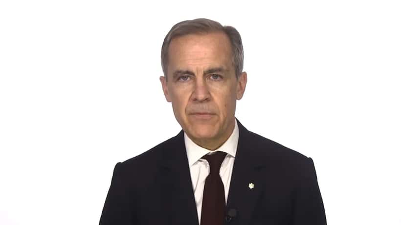Mark Carney lors d'une conférence sur la finance climatique, discussant de politique économique